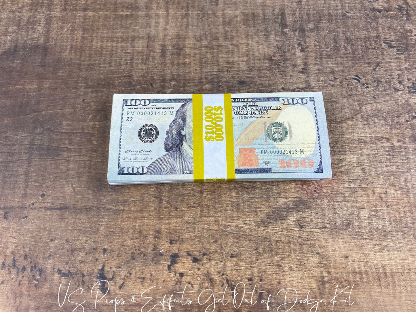 "Get Out of Dodge" Kit- Includes Solid Foam Rubber Gun, Stack of Prop Movie Money, and a US Props & Effects Prop Passport
